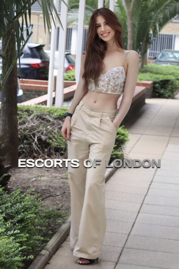 Exclusive Reddish brown haired London escort Mallory is 5’7