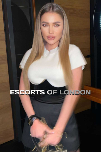  Exclusive Dark blonde haired London escort Alessia is 5'8